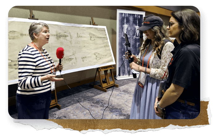 Woman giving a presentation on the Shroud of Turin.