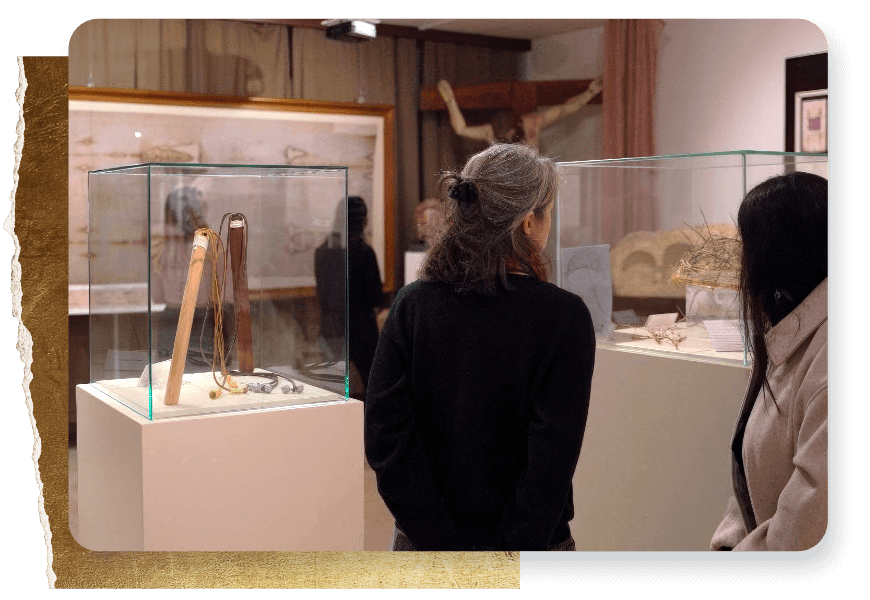 Women viewing artifacts at the exhibit.