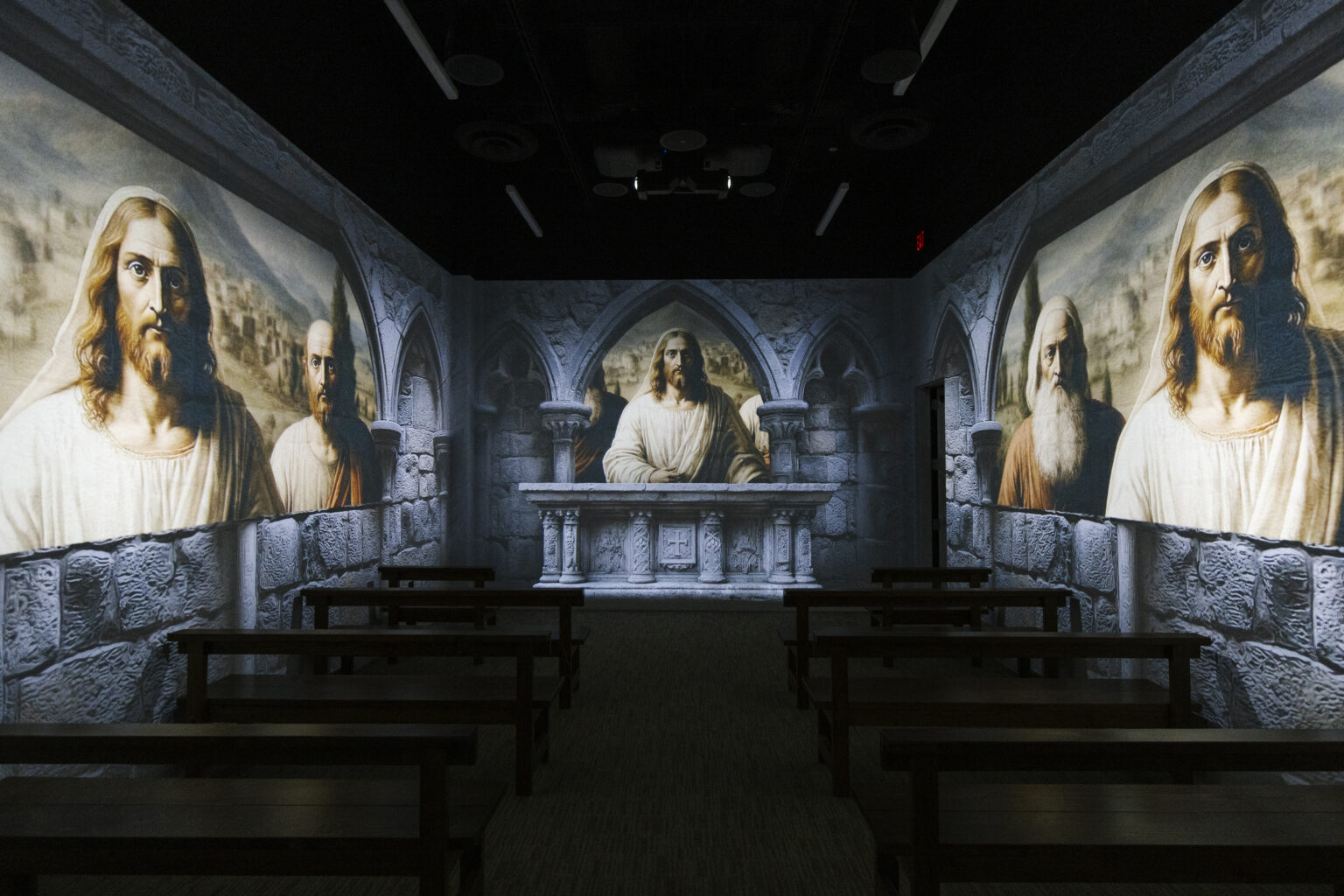 A 360-degree immersive theater surrounded by projected scenes from the life of Jesus